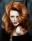 Long red hair with semi spiral curls