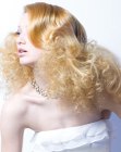 Bridal hairstyle with small curls and large waves