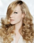 Long and curly blonde hair with smooth bangs