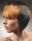 bob hairstyle with golden and copper streaks