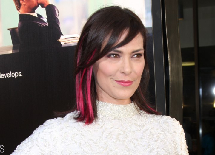 Hair with red or pink streaks - Michelle Forbes