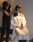 Caped girl at hair show