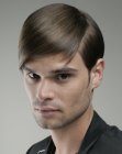 men's haircut with the sides over the ears