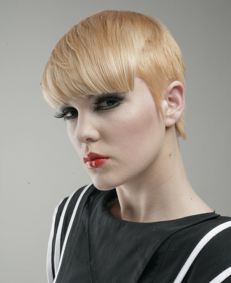 Short Hairstyle With The Hair Cut Around The Ears And Fringe Along The Neck Short Hairstyle With The Hair Cut Around The Ears And Fringe Along The Neck