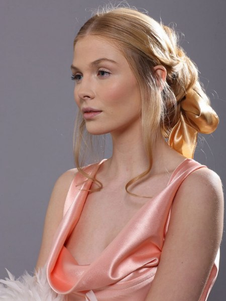 Hairstyle with a bun and a wrapped silk scarf