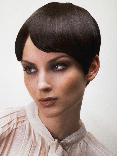 Pixie cut with a smooth finish and styling for a satiny look