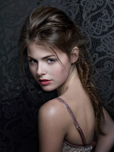 Long brown hair with a twisted braid