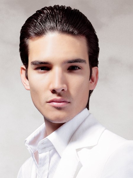 Classic men's hair styled away from the face with gel