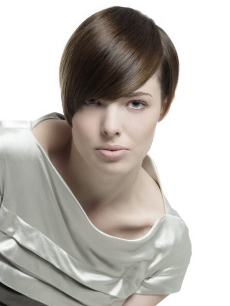 Fashionable short haircut with one side clipped up shorter