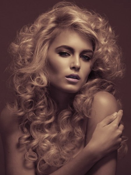 Long blonde hair with satiny cascading curls
