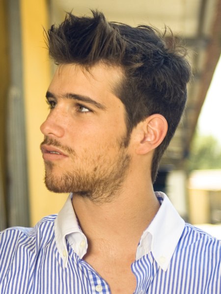 Stylish male hairdo with longer hair on top
