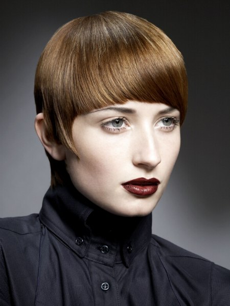 Short haircut with rounded bangs and longer sides