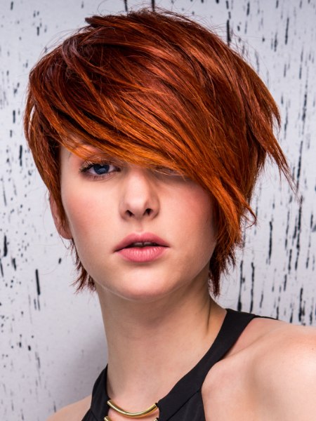 Short red hair with the fringe styled to one side