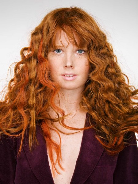 Long red hair with waves and bangs
