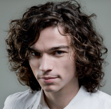 Long hair style for men with curls