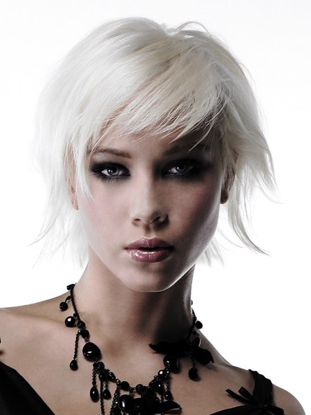 Platinum white short hairstyle with textured ends