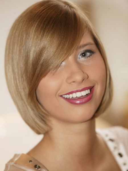 Bob haircut with a curved fringe