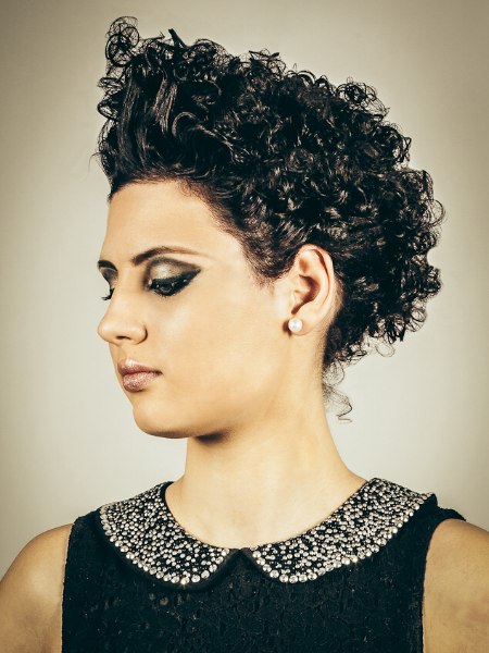 Short hair with shimmery gel styled curls