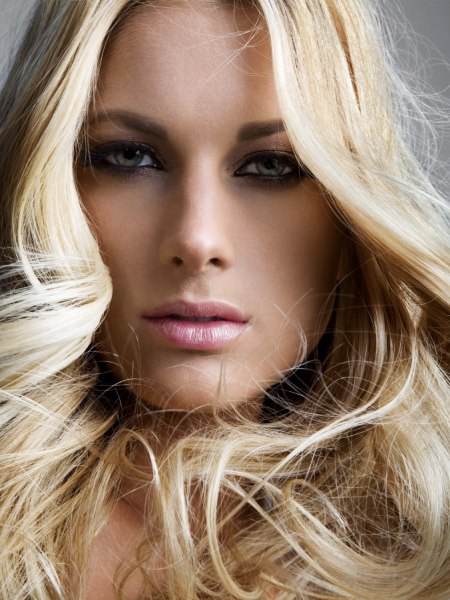 Long face framing hair with baby blonde highlights