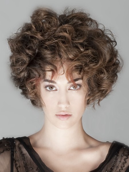 Short brown haircut with large curls