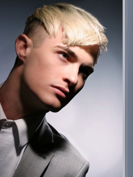 Short and practical male haircut with shaven sections