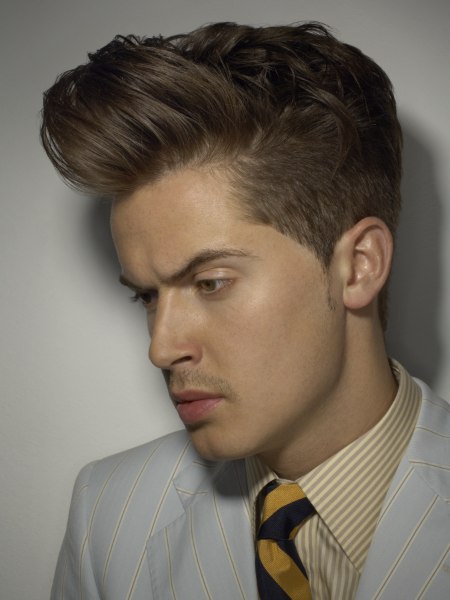 Men's hairstyle with closely clipped sides