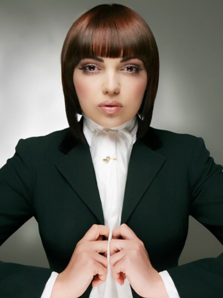 Sleek bob almost touching the shoulders in a forward tapered length