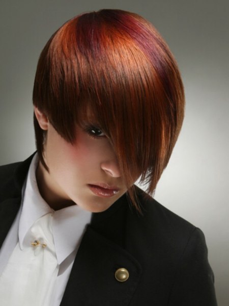 Reversed bob with layers of copper and cool berry hair tones
