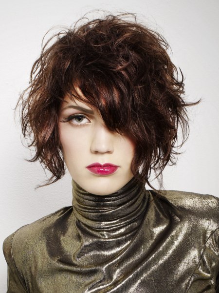 Tousled bob with an A-line shape and a shiny rollneck top
