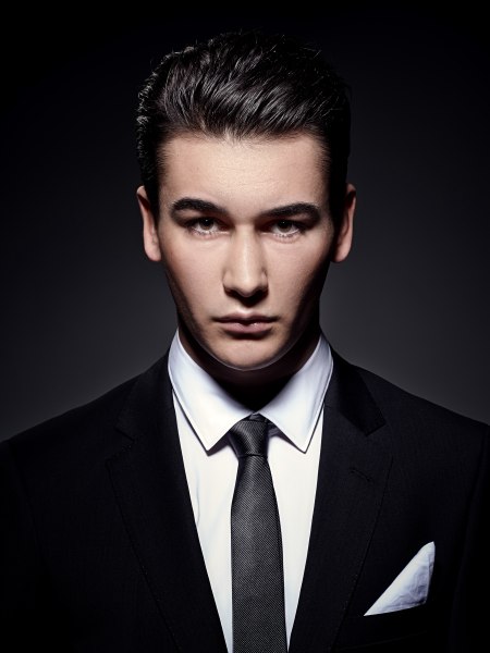 Slick old fashioned hair with pomade for men