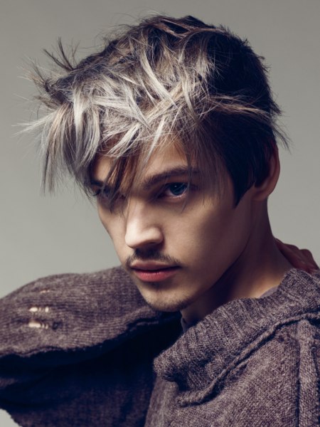 Men's hair with silver color on a black background