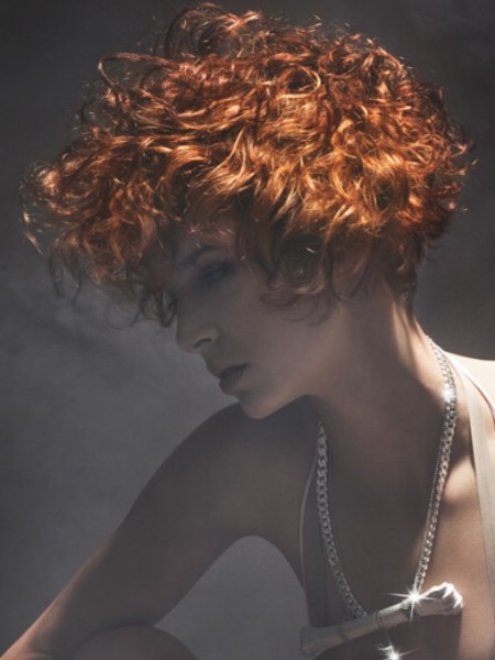Short red hair with curls