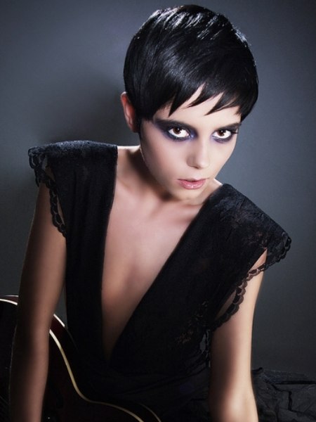 Short goth hair style with shiny gel styling