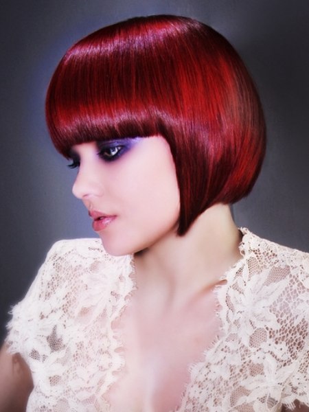 Chin length bob with bangs for red hair