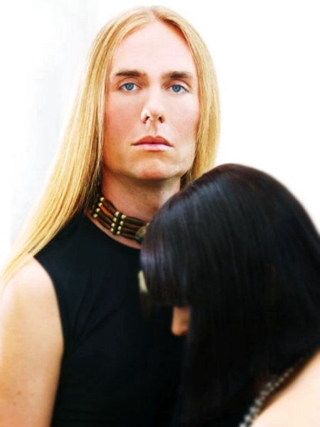 Man with long flaxen locks and a girl with an ultra-smooth bob hairstyle
