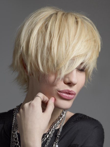 Rough short haircut with a long fringe