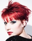 Punk haircut with layers and spikes for red hair