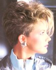 1980s haircut with a shaved neck for women