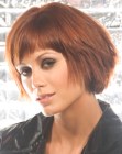 Textured bob with curved bangs and a longer back