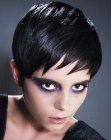 Short, sleek and shiny goth hair with gel styling