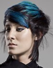 Short hairstyle with contrasting blue and black hair