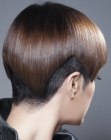 Short hairstyle with a buzzed undercut and sideburns