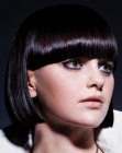 Sleek bob with jaw length sides and wide bangs
