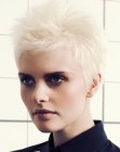 Platinum blonde pixie cut with a round silhouette