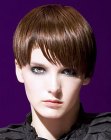 Sleek fringe-heavy hairstyle with textured ends