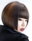 Asian hair cut into a short bob with horizontal bangs