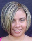Glossy short chin-length bob with a high side part