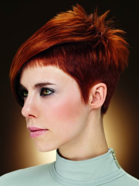 Short haircut with clipper cut sides for women