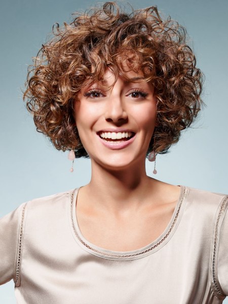 Short hairstyle with small curls and a round shape