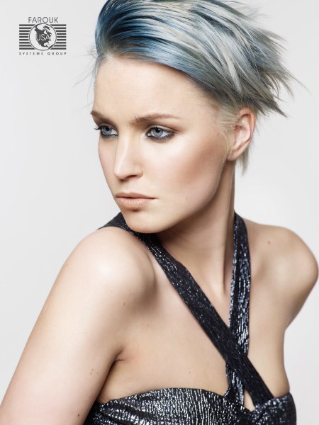 Trendy short haircut with metallic and blue hair coloring